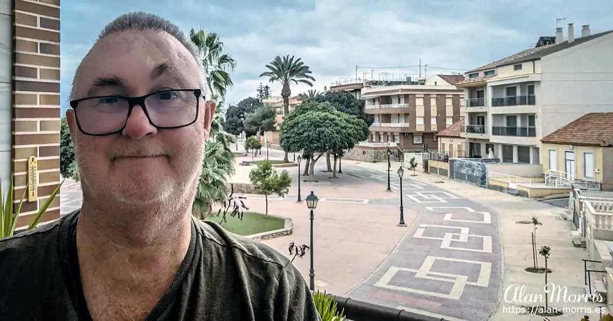 Alan Morris on the balcony of his apartment in Los Alcazares.